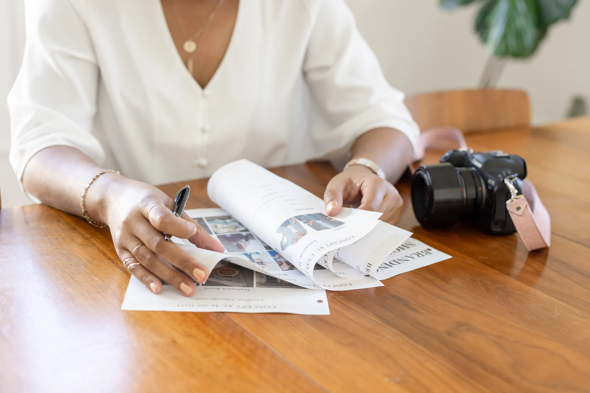 Angie getting ready for a brand photoshoot, illustrating techniques to secure steady bookings as a branding photographer.