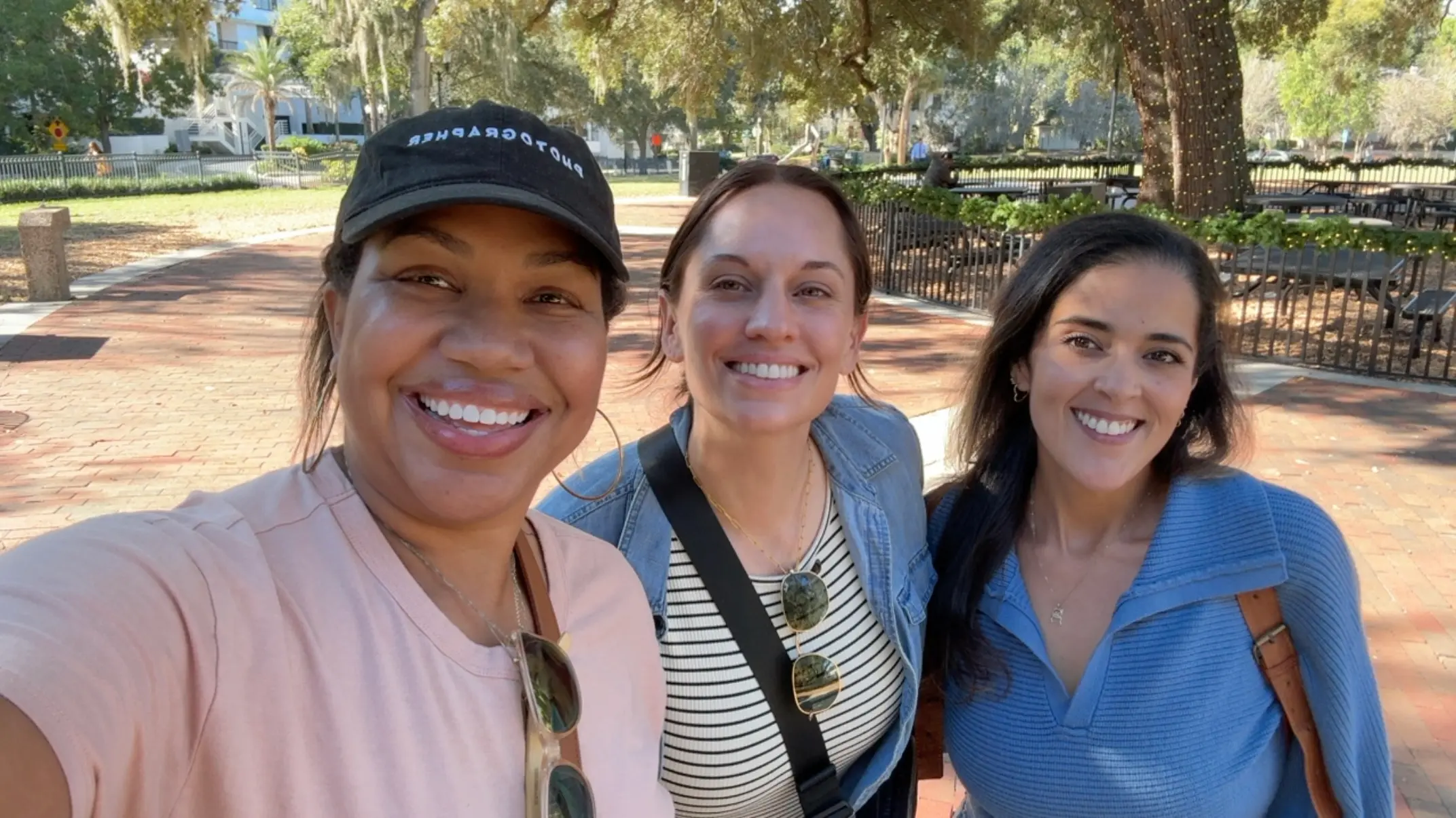 Angie with two Florida business owners connect in person through WlthWlks, highlighting relationship-driven networking and local business community in Florida.